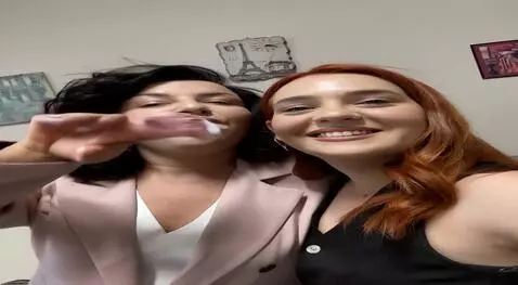 AI Video from prompt: In the photo, two women look directly at the cam