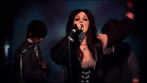 AI Video from prompt: A gothic indie rock band with a cute pretty girl