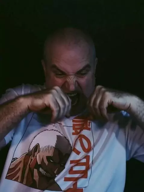 AI Video from prompt: becomes an aggressive monkey and screams