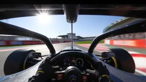 AI Video from prompt: POV: F1 racer driving on speed track