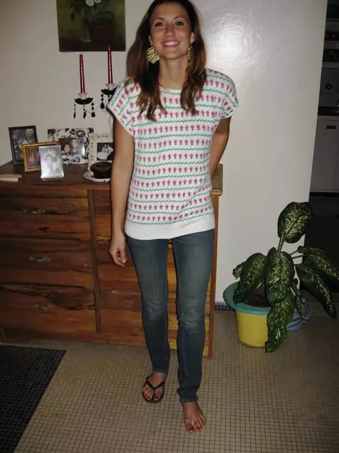 AI Video from prompt: A young woman with dark hair, wearing blue jeans