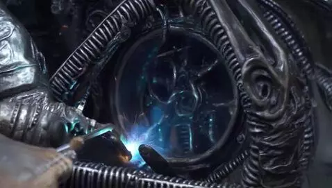AI Video from prompt: Space Jockey sweilding on metal inside an Alien 
