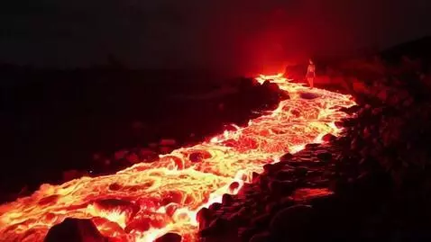 AI Video from prompt: A fantasy scene of a girl standing near a glowin