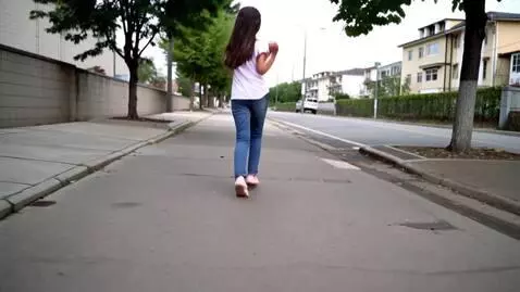 AI Video from prompt: girl dancing walking to the street