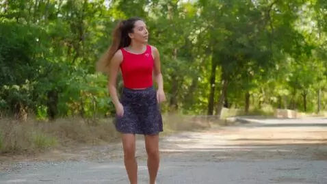 AI Video from prompt: Asmr girl stretching mini skirt