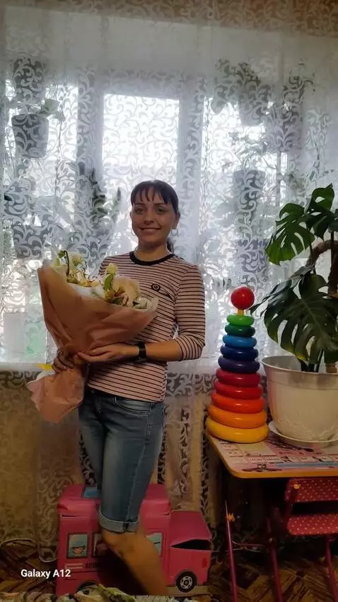 AI Video from prompt: Girl smiles, more light in the room