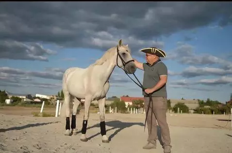 AI Video from prompt: Dress this man up as Napoleon Bonaparte