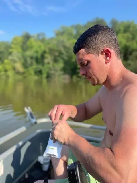 AI Video from prompt: Have the guy pull out a small baggie and snort a