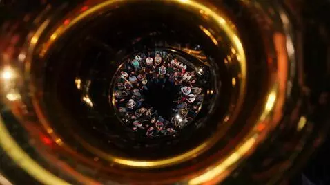 AI Video from prompt: 🎶 Detroit Jazz Festival — Saxophone as Witness  