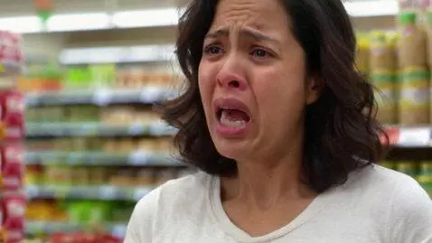 AI Video from prompt: hungry women crying in a Tesco