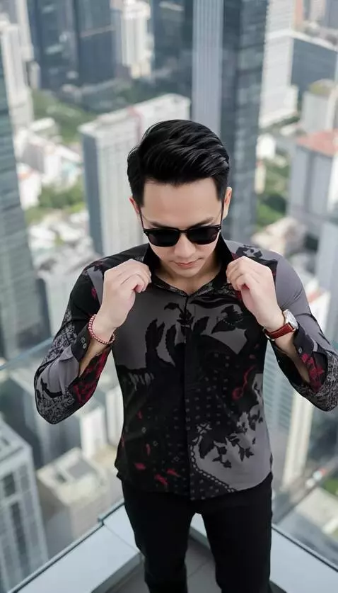 AI Video from prompt: make a movement of both hands holding the shirt 