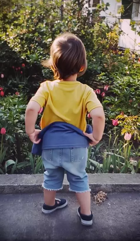 AI Video from prompt: He turns and waves his hand