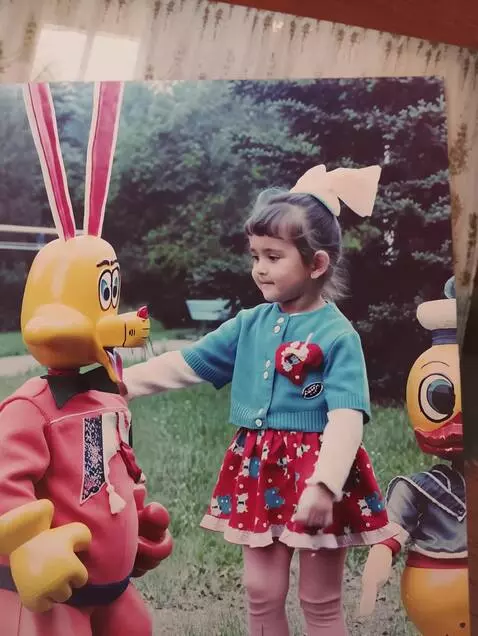 AI Video from prompt: hugs the toy to his left