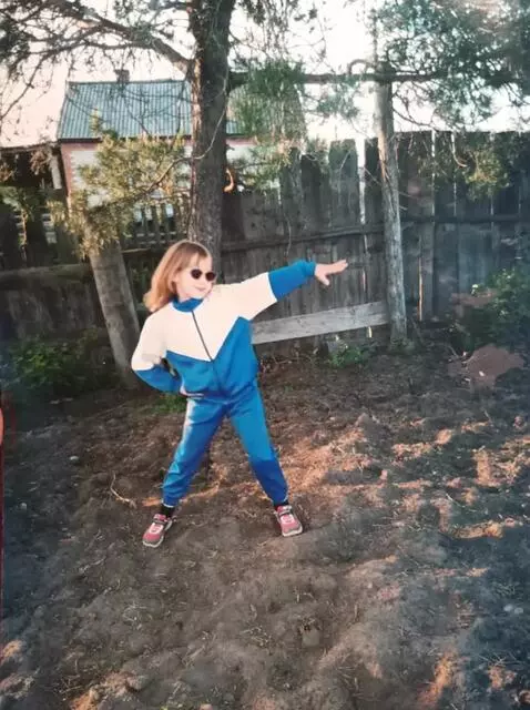 AI Video from prompt: The girl dances cheerfully to the music
