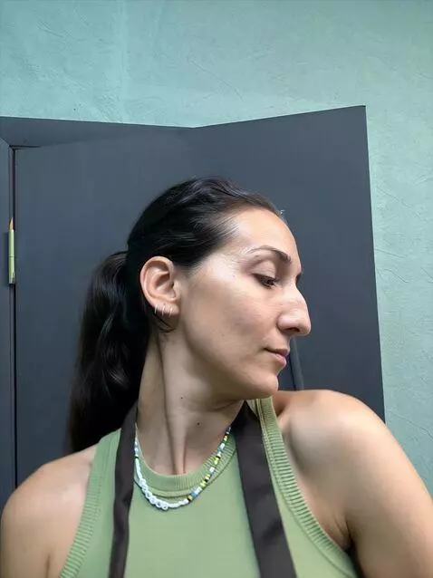 AI Video from prompt: A woman dances seductively in front of the camer