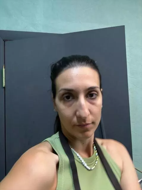 AI Video from prompt: The girl dances seductively in front of the came