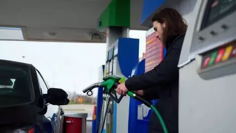 AI Video from prompt: Create a color CCTV-style video showing a person