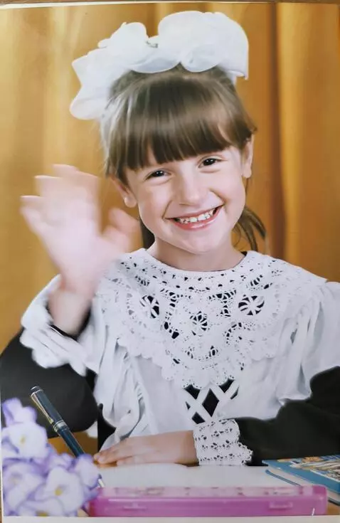 AI Video from prompt: He smiles and waves his hand