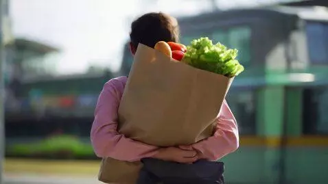 AI Video from prompt: Getting on board a public transport under the ho