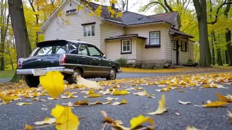 AI Video from prompt: A small old car parked in front of an old house.