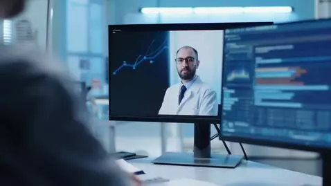 AI Video from prompt: Close-up to a computer monitor, screen flickers 