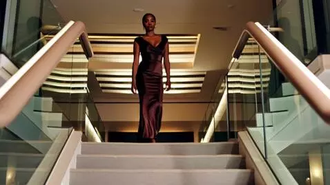 AI Video from prompt: A confident young African American woman in a fi