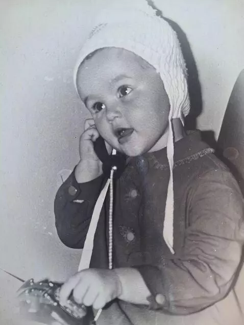 AI Video from prompt: He's talking on the phone he's holding in his ha