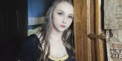 AI Video from prompt: A pretty 25-year-old young Russian woman sadly s