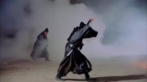 AI Video from prompt: the guardians in the black robes are chasing hum