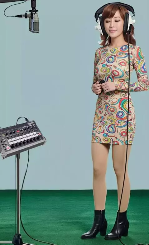 AI Video from prompt: A young woman in a recording studio. He listens 