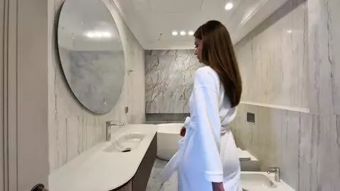 AI Video from prompt: A young, beautiful, slender European-looking wom