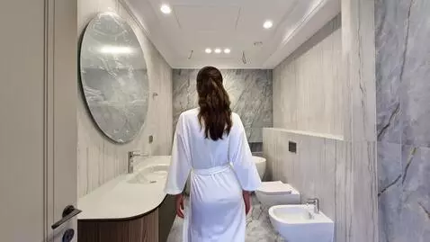 AI Video from prompt: A young, beautiful, slender European-looking wom