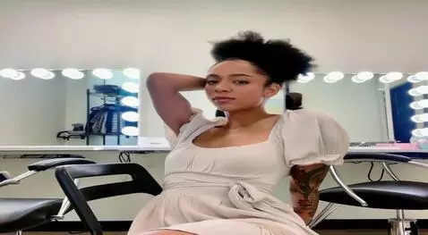 AI Video from prompt: She takes off her dress and bra