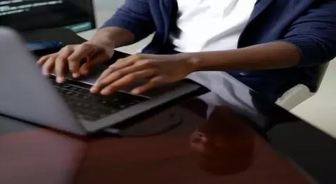 AI Video from prompt: create a scene of me typing on my keyboard.