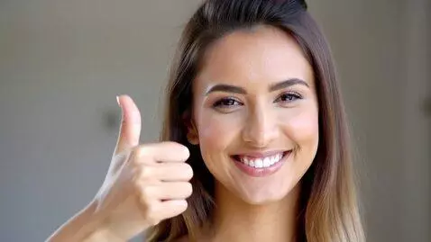 AI Video from prompt: A very beautiful young woman, smiling brightly, 