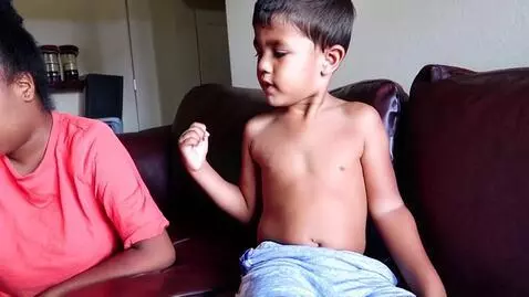 AI Video from prompt: The boy took off his shorts