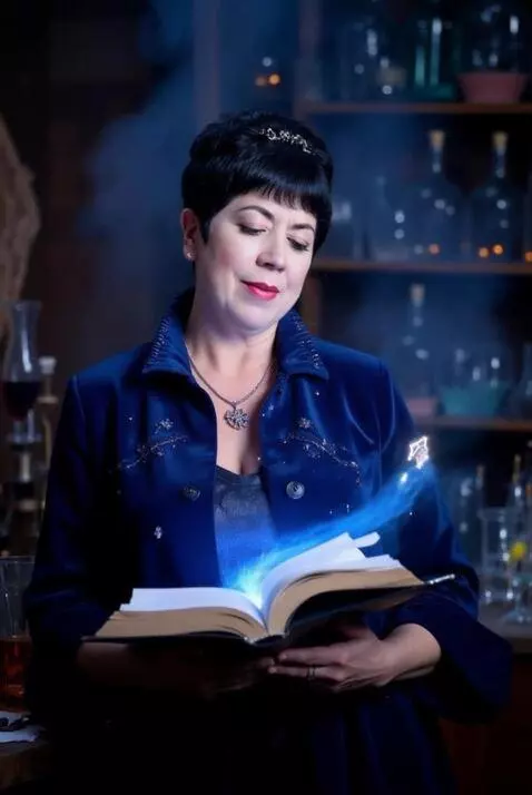 AI Video from prompt: The sorceress works in her magic library, add fo