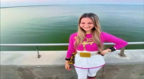 AI Video from prompt: teenage girl flying up and out of frame for a wh