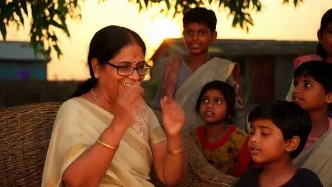 AI Video from prompt: 3D cartoon style, Indian village courtyard at su