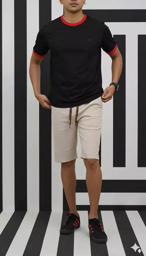 AI Video from prompt: A man showcasing cool shorts while walking forwa