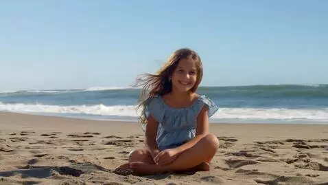 AI Video from prompt: a girl under the sun at the beach & a tsunami co