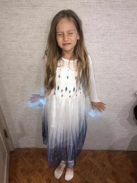 AI Video from prompt: The girl controls ice like Elsa and creates a ti