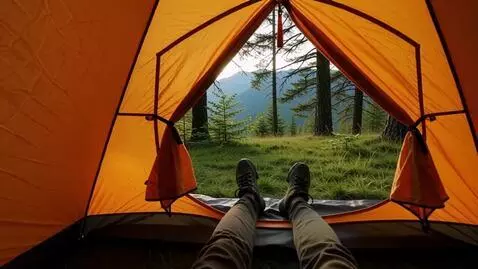 AI Video from prompt: First-person view from inside a cozy orange camp