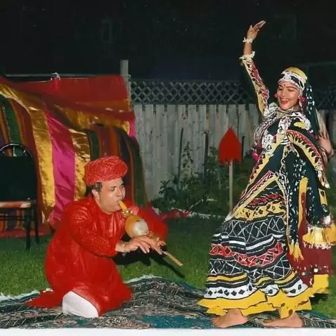 AI Video from prompt: A vibrant cultural scene set in front of the maj