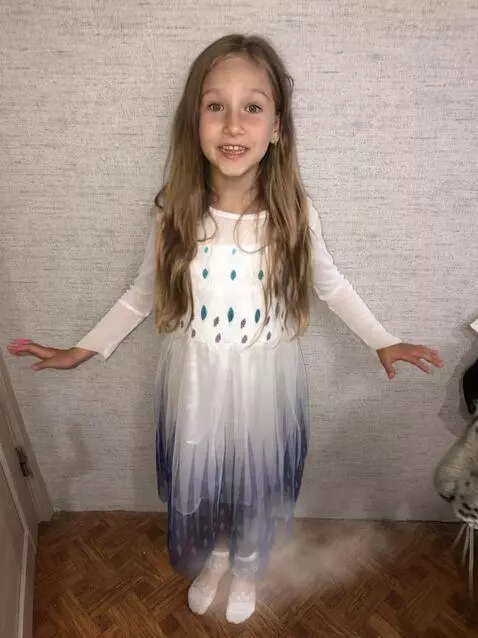 AI Video from prompt: An ice tiger approaches the girl, ice steam come