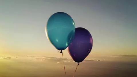 AI Video from prompt: A cinematic wide shot of a vibrant blue balloon 