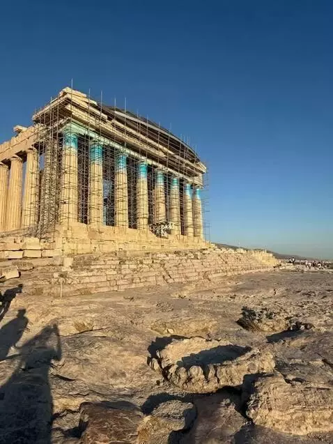 AI Video from prompt: Ancient acropolis transformed into futuristic bu