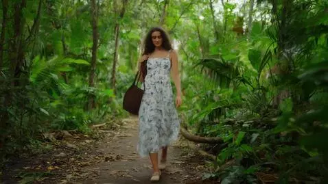 AI Video from prompt: A beautiful girl walking in the jungle