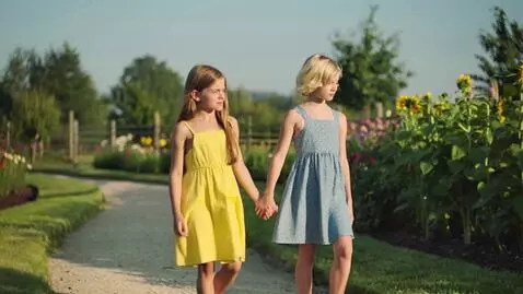 AI Video from prompt: Two girl walking in the garden