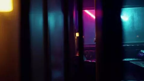 AI Video from prompt: Title: “Clubroom Node —  Night in NeuroCity”    